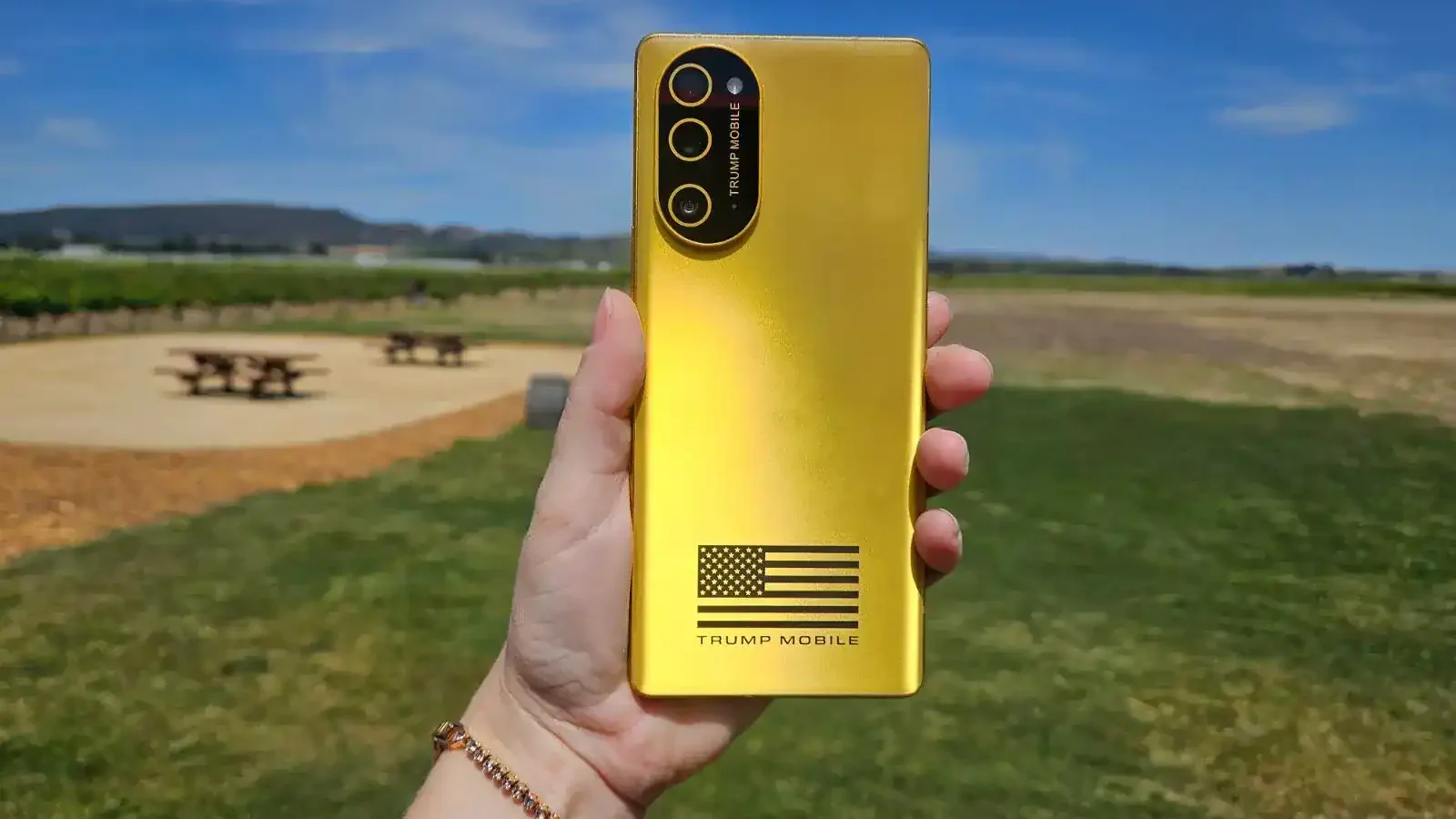 Trump Mobile T1 Price Hike gold color smartphone
