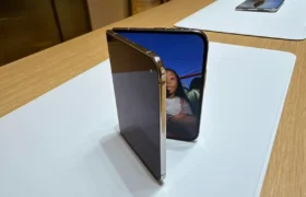 iPhone Duo in-store stock retail packaging displayed on an Apple Store table